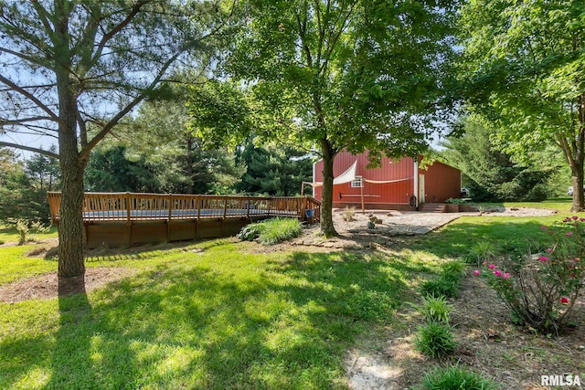 view of yard with a deck