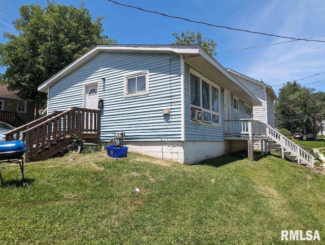 view of property exterior featuring a lawn