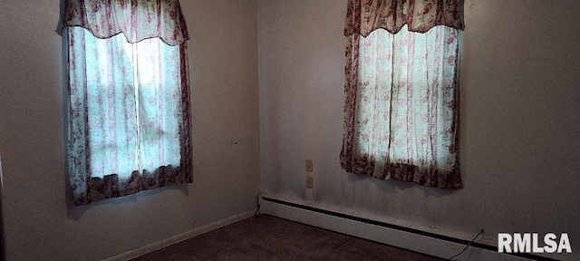 108 N Spencer St, Mounds, IL 62964 - spare room with a baseboard radiator and baseboards