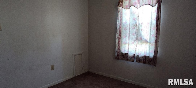 108 N Spencer St, Mounds, IL 62964 - unfurnished room with dark colored carpet