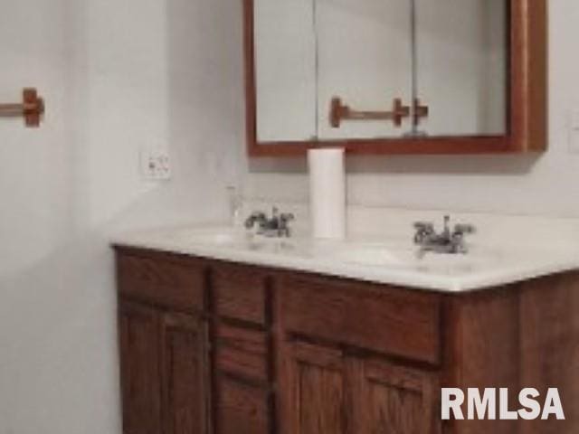 108 N Spencer St, Mounds, IL 62964 - bathroom featuring double vanity