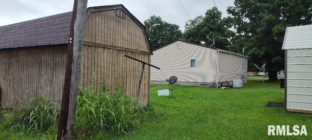 view of home's exterior featuring a yard