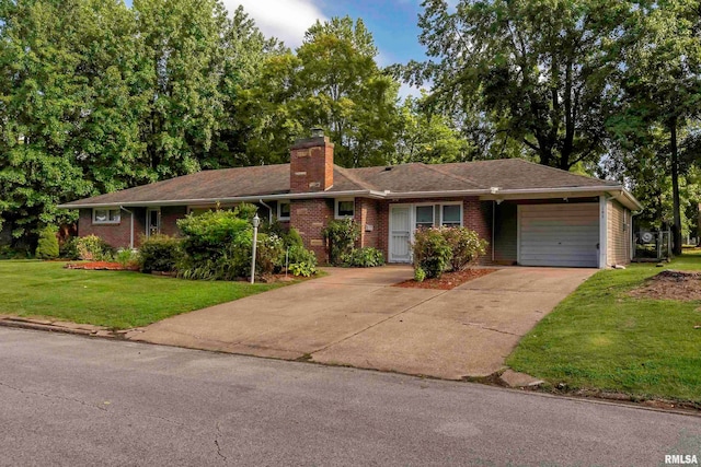 ranch-style home with a garage and a front lawn