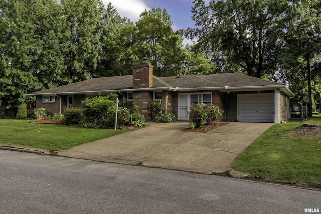 single story home with a garage and a front lawn