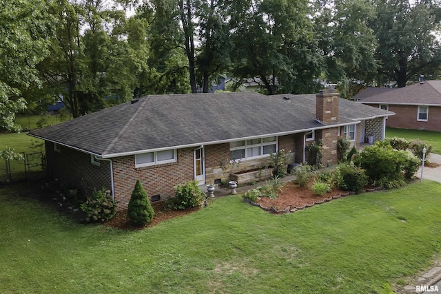 single story home featuring a front lawn