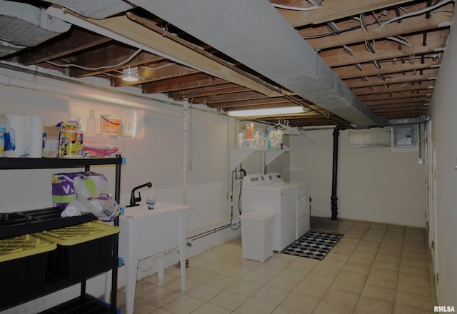 unfinished basement featuring separate washer and dryer