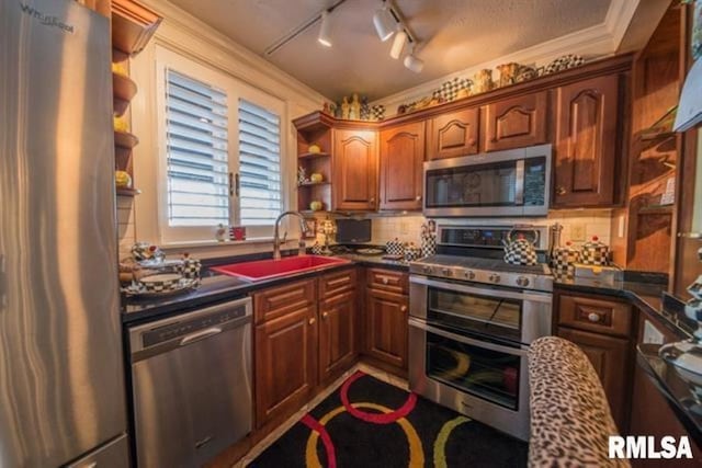 521 S Park Ave, Herrin, IL 62948 - kitchen with appliances with stainless steel finishes, open shelves, and tasteful backsplash