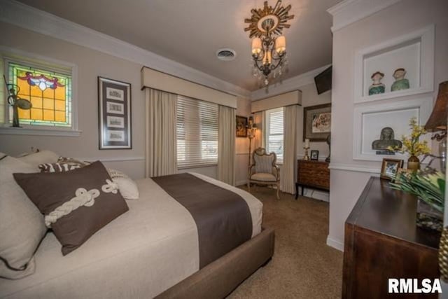 521 S Park Ave, Herrin, IL 62948 - bedroom with a chandelier, carpet flooring, and ornamental molding