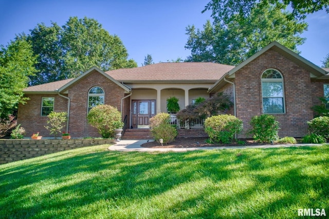 single story home with a front lawn