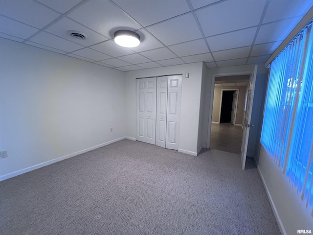 unfurnished bedroom with a closet and carpet