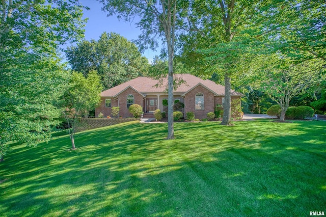 view of front of property with a front lawn