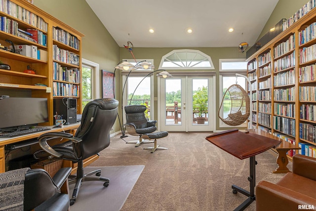 home office featuring french doors, carpet floors, a wealth of natural light, and lofted ceiling