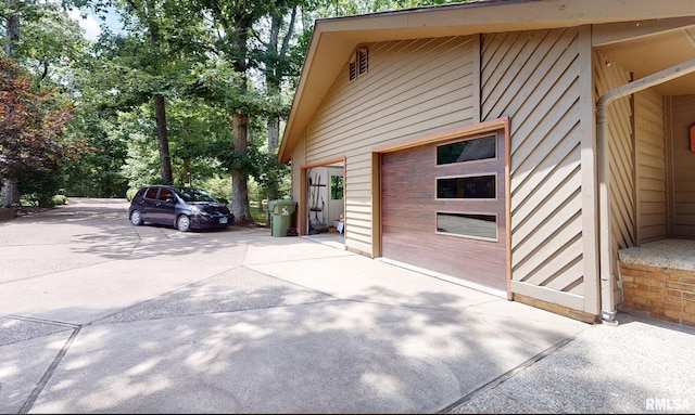 view of home's exterior with a garage