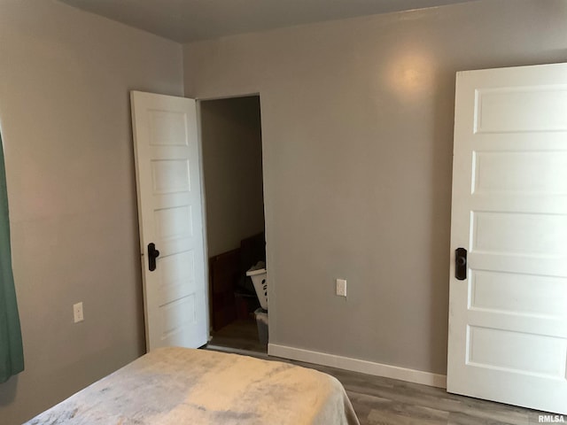 bedroom featuring hardwood / wood-style flooring