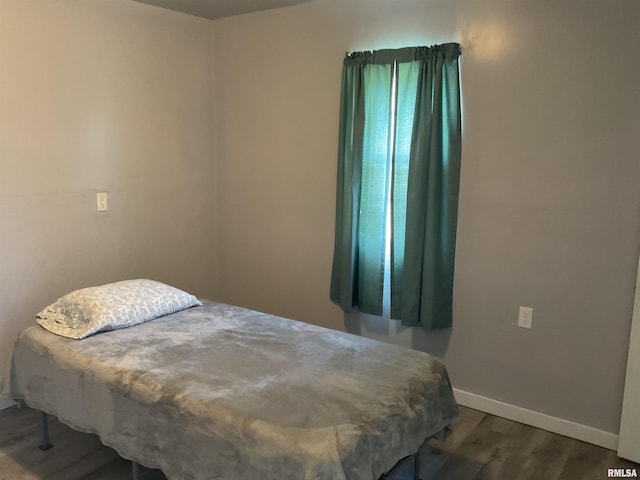 bedroom featuring hardwood / wood-style floors