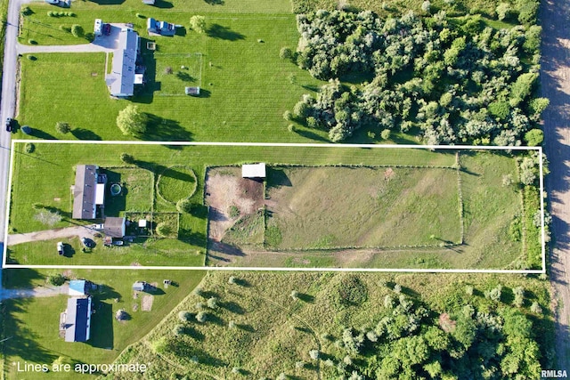 birds eye view of property featuring a rural view