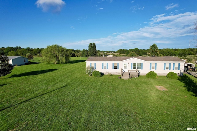 view of front of property with a front lawn