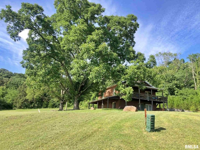 view of yard featuring a deck