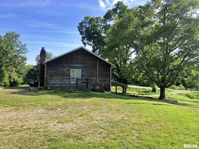 view of home's exterior featuring a yard