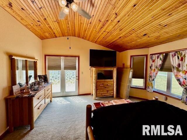 carpeted bedroom featuring ceiling fan, french doors, lofted ceiling, access to exterior, and wood ceiling