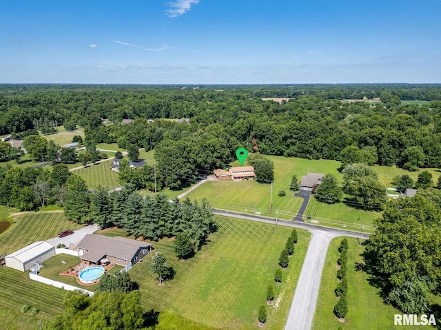 birds eye view of property featuring a rural view