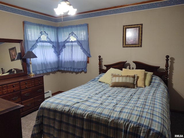 bedroom featuring carpet floors, baseboard heating, and crown molding