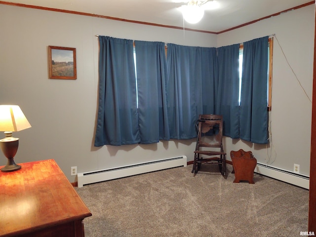 interior space featuring ceiling fan, carpet flooring, and a baseboard heating unit