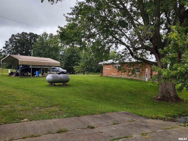 view of yard featuring a carport