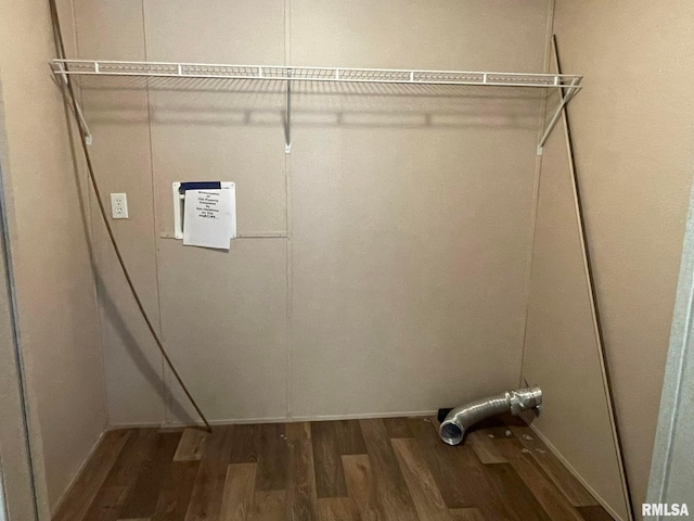 laundry room with hardwood / wood-style floors