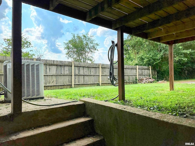 view of yard with central AC