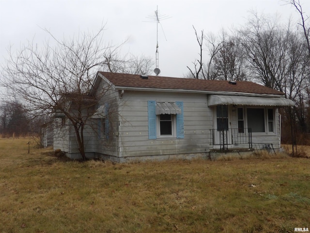 exterior space with a front yard