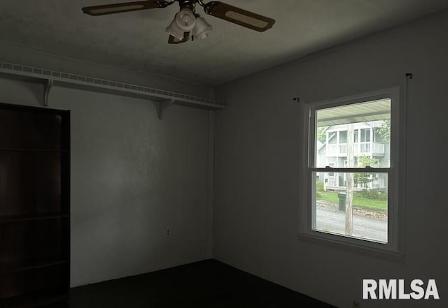 spare room featuring ceiling fan