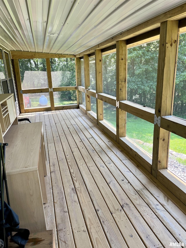 unfurnished sunroom with wooden ceiling