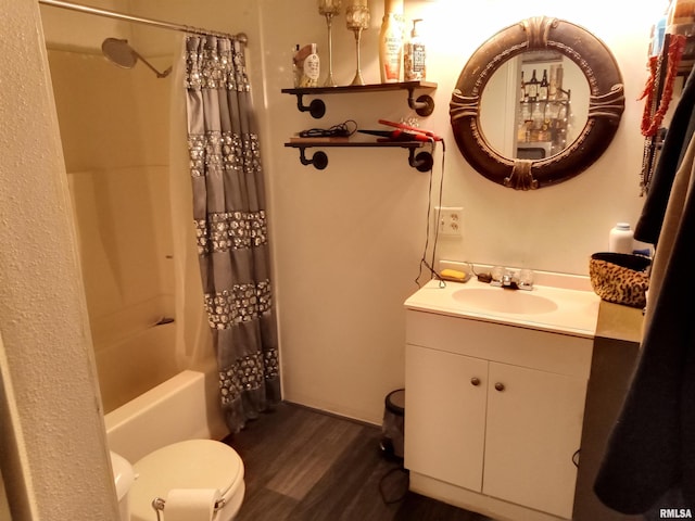 full bathroom with toilet, shower / tub combo, vanity, and hardwood / wood-style flooring