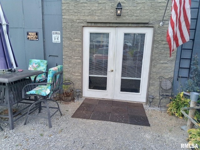 entrance to property featuring french doors