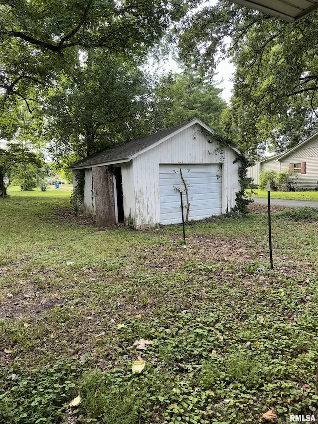 view of outdoor structure featuring a garage