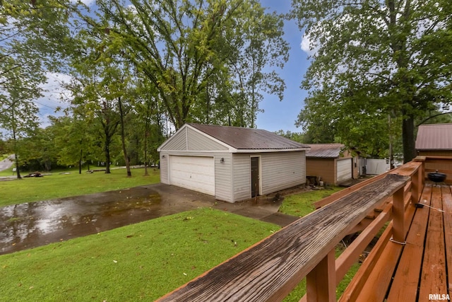 garage featuring a yard