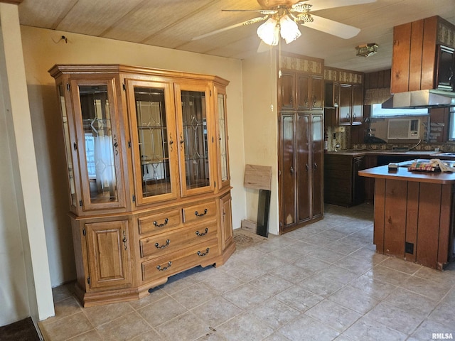 kitchen featuring tasteful backsplash and ceiling fan