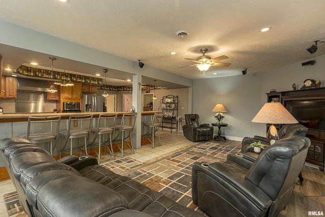 living room with ceiling fan