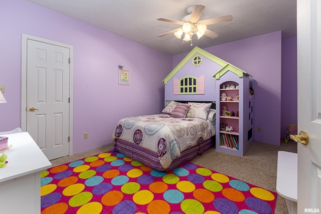 bedroom featuring ceiling fan and light colored carpet