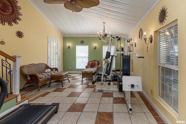 exercise room featuring light tile patterned floors, ceiling fan with notable chandelier, vaulted ceiling, and wooden ceiling