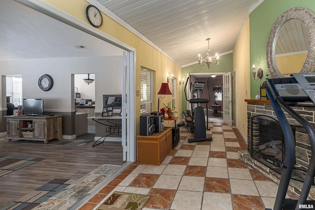 hallway featuring light tile patterned flooring, lofted ceiling, a chandelier, and wooden ceiling