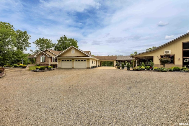 single story home with a garage