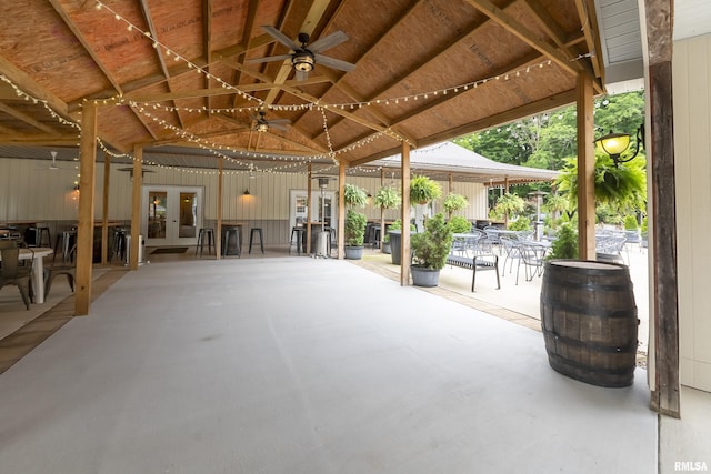 view of patio / terrace featuring a gazebo, french doors, and ceiling fan