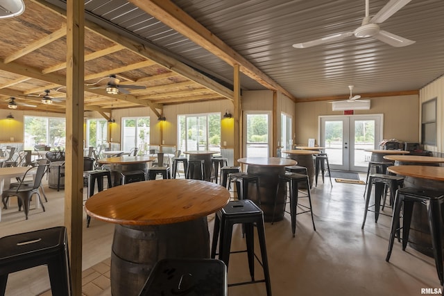 dining space featuring french doors, ceiling fan, and plenty of natural light