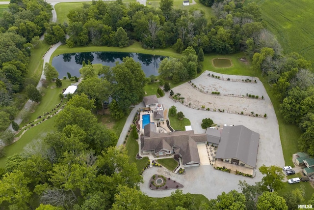 birds eye view of property featuring a water view