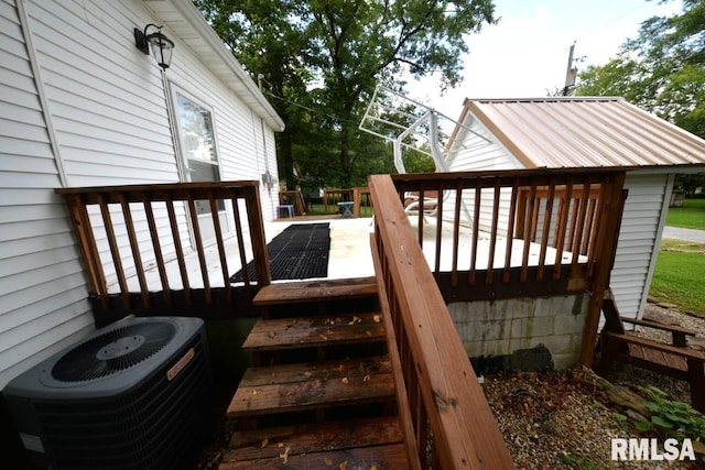 wooden terrace featuring central AC