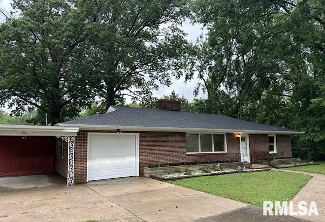 single story home featuring a garage and a carport