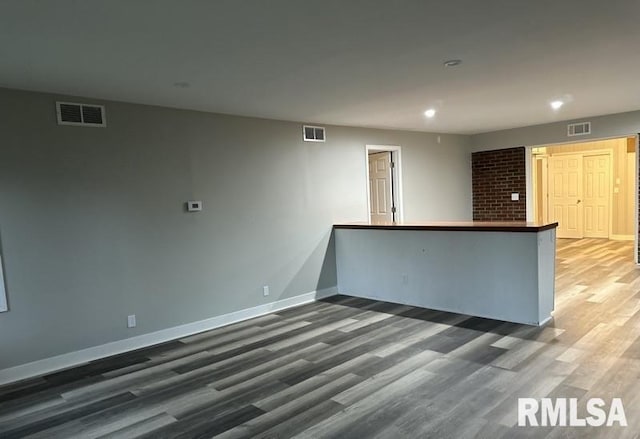 interior space with dark wood-type flooring