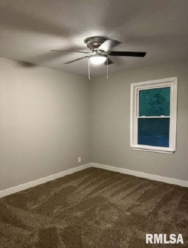 carpeted empty room with ceiling fan